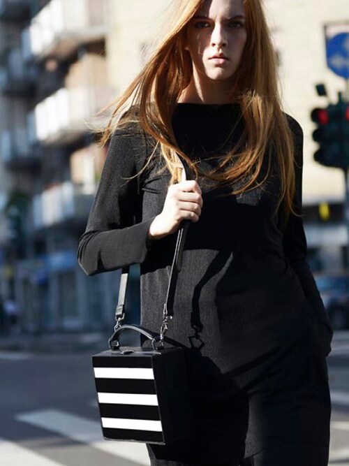CHARLES & KEITH is wearing CHARLES & KEITH "MONOCHROME STRIPE BOXY BAG"