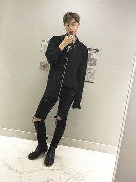 Xiuyi-Tuan is wearing marsell "Grained-Leather Boots"