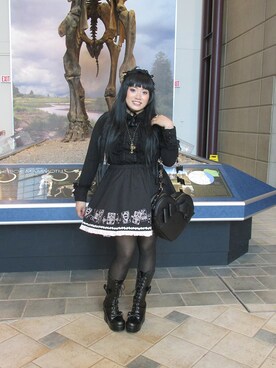 Kim is wearing "H.Naoto FRILL Frill Trump Embroidery Skirt + Apron Set"