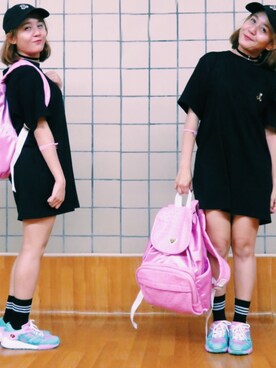 Suria Little Kay Cee is wearing JOYRICH "Ostrich Mixed Backpack"