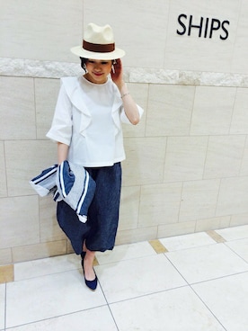 「アイテム（ハット、イエロー系）」を使った、西澤さん（レディース・159cm）の冬コーディネート