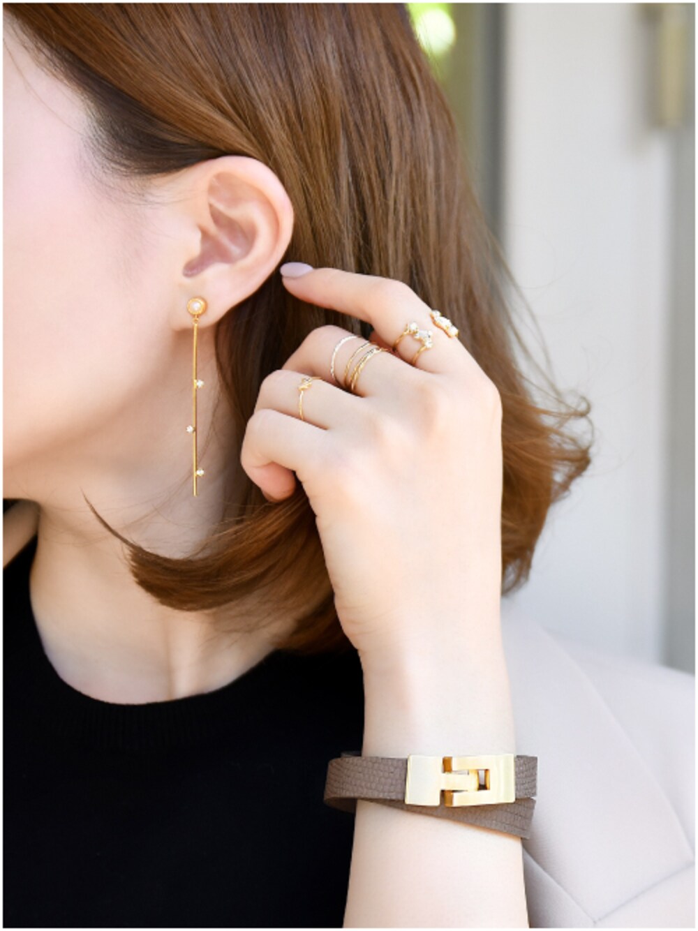 その他のリング、その他のリング、その他のイヤリングを着用したレディースの秋コーディネートの1枚目の写真