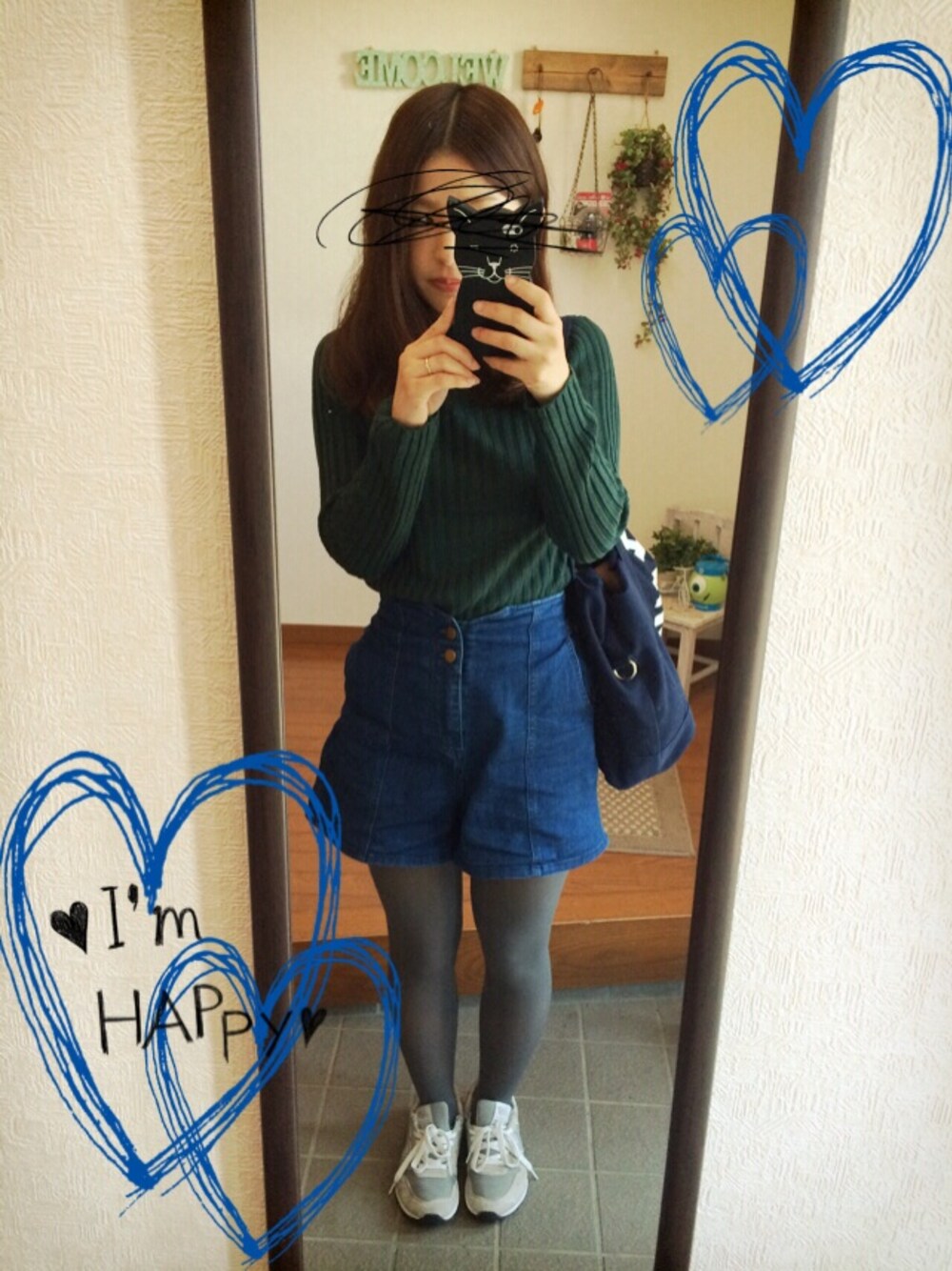 グリーン系のニット/セーター、ブルー系のその他パンツ、ブルー系のトートバッグを着用したレディースの秋コーディネートの1枚目の写真