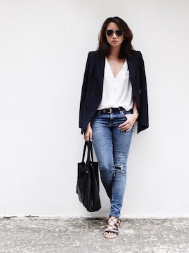 「wearsg」｜「アイテム（トートバッグ）」を使った、Melissa Megan Teeさん（レディース・170cm）の冬コーディネート