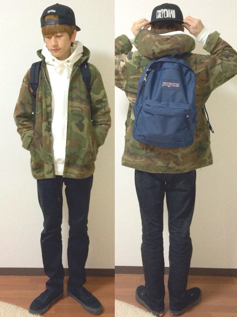 グリーン系のミリタリージャケット、ブルー系のバックパック/リュック、ホワイト系のパーカーを着用したメンズの春コーディネートの1枚目の写真