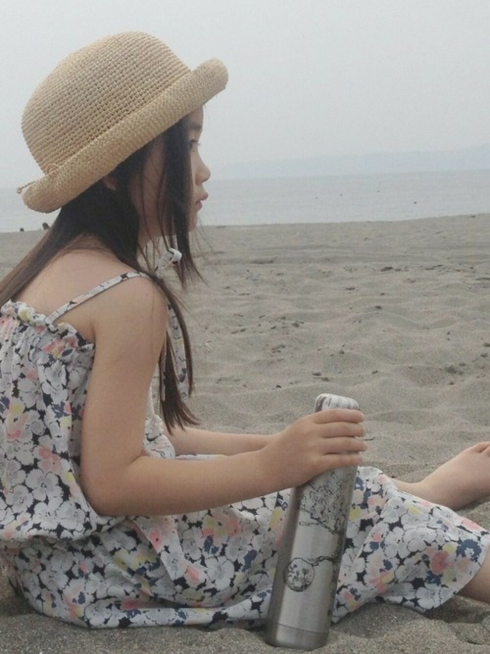 「夏、花柄、サロペット、kids、海、白、子供服、SALE」｜「ARCHIのCLARO ALL IN ONE（つなぎ/オールインワン、ホワイト系）」を使った、eppieさん（キッズ・115cm）の夏コーディネートの1枚目の写真