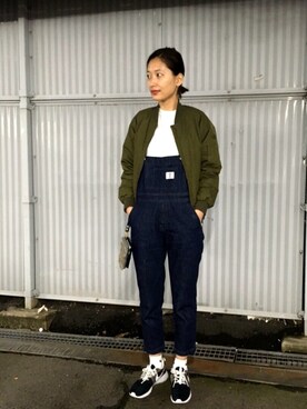 「THE NORTH FACE（ザノースフェイス）のアイテム（ミリタリージャケット）」を使った、潮田あかりさん（レディース・166cm）の冬コーディネート