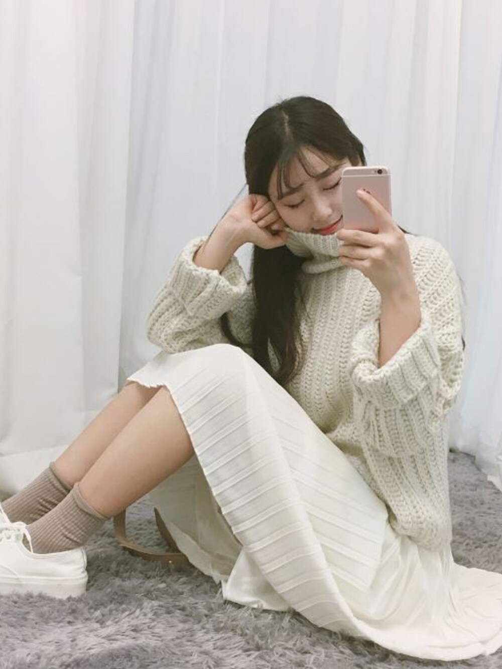 その他のニット/セーターを着用したレディースの秋コーディネートの1枚目の写真