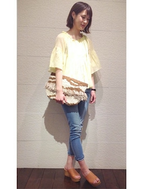 「アイテム（クラッチバッグ）」を使った、本田さん（レディース・170cm）の冬コーディネート