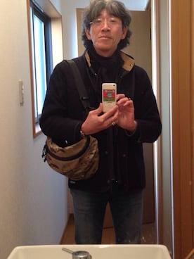 「アイテム（マウンテンパーカー、ブルー系）」を使った、Toshiki Harutaさん（メンズ・173cm）の冬コーディネート