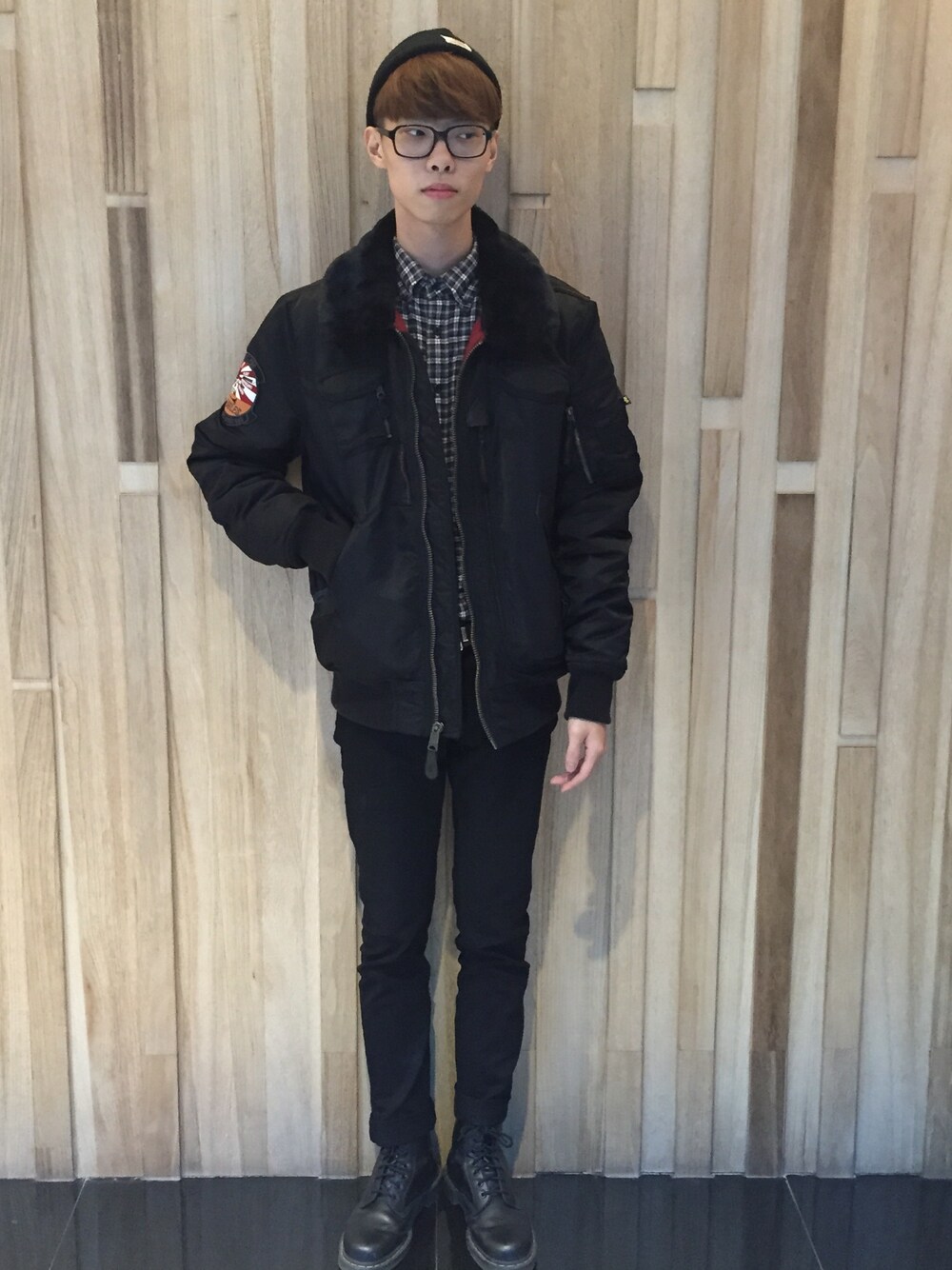 「alpha、carhartt、UNIQLO、cheap monday、Dr.Martens」｜「Alpha Industriesのアイテム（ナイロンジャケット、ブラック系）」を使った、楚門さん（メンズ・183cm）の冬コーディネートの1枚目の写真