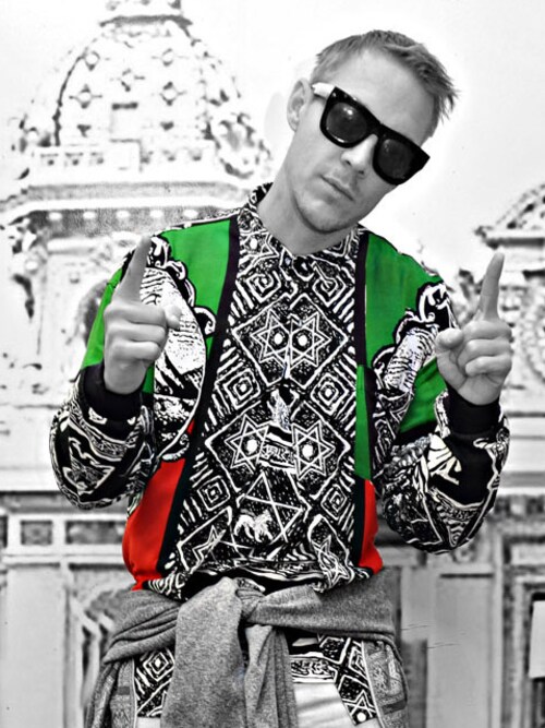 FRUITIONLV is wearing Fruition Las Vegas "Archival Conquistador Depicted Silk Button Up"
