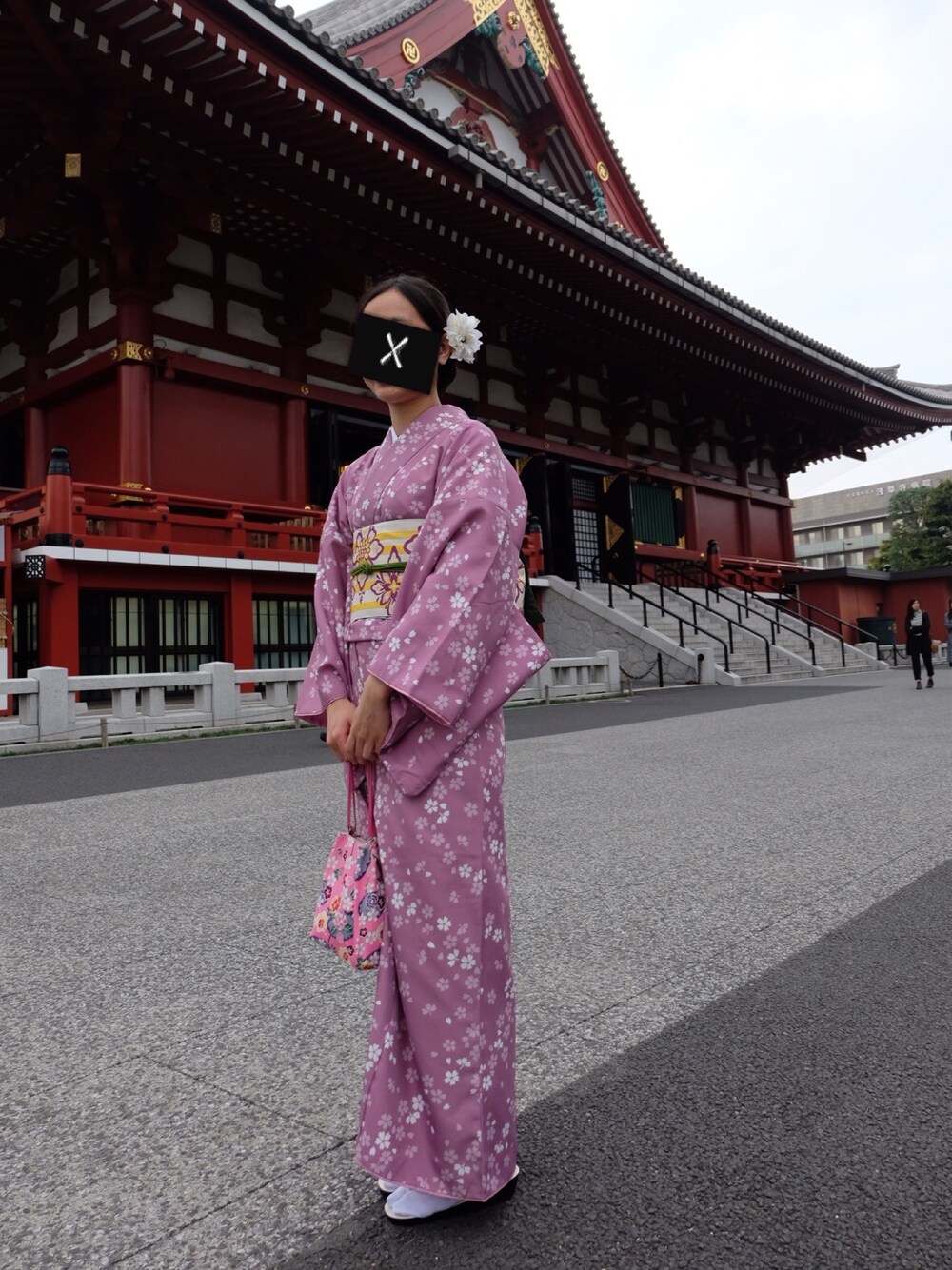 パープル系のつなぎ/オールインワンを着用したレディースの冬コーディネートの1枚目の写真