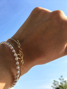 「アイテム（ブレスレット）」を使った、岩谷 英里子さん（レディース・169cm）の秋コーディネート