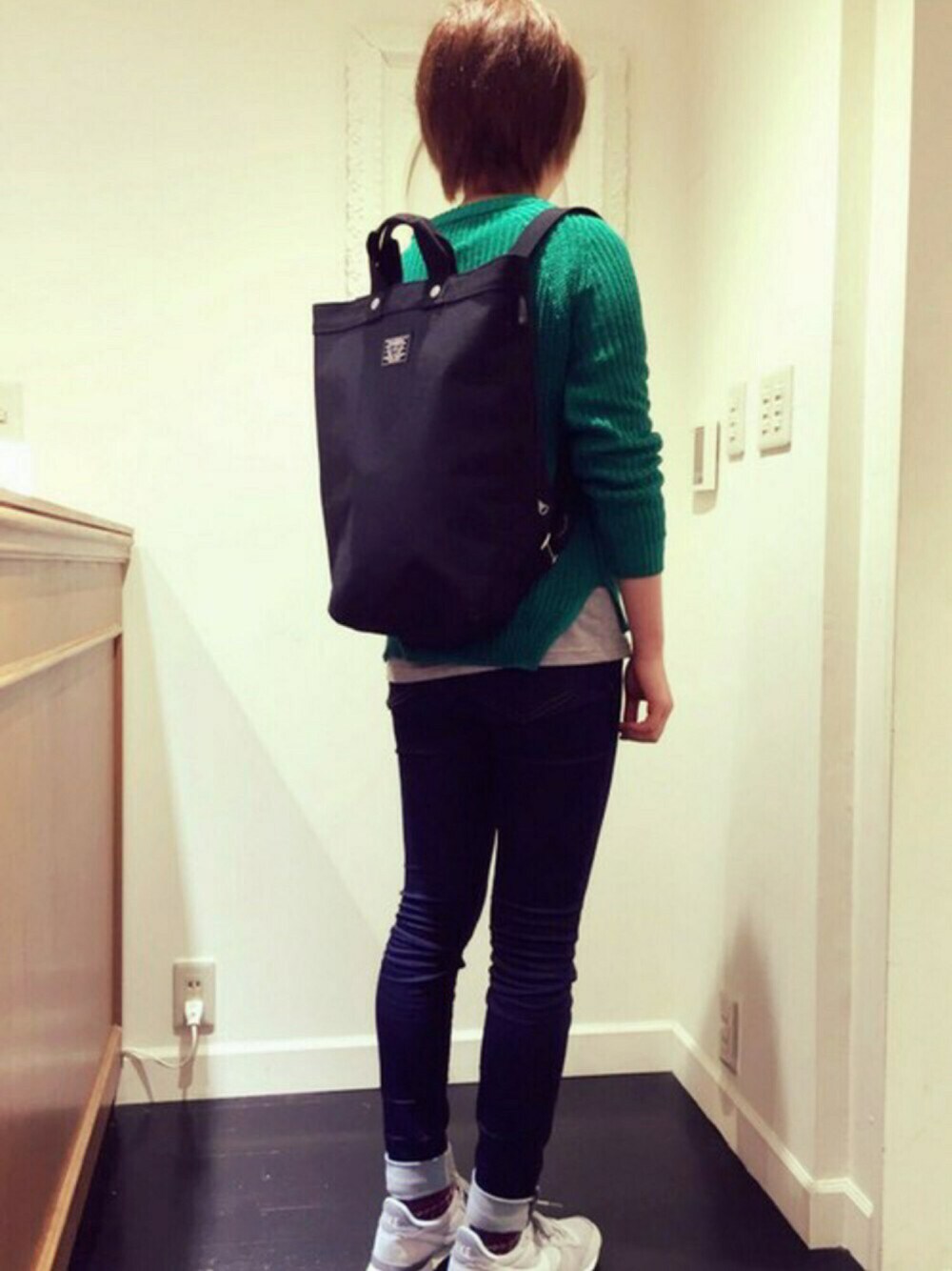 ブラック系のバックパック/リュックを着用したレディースの冬コーディネートの1枚目の写真