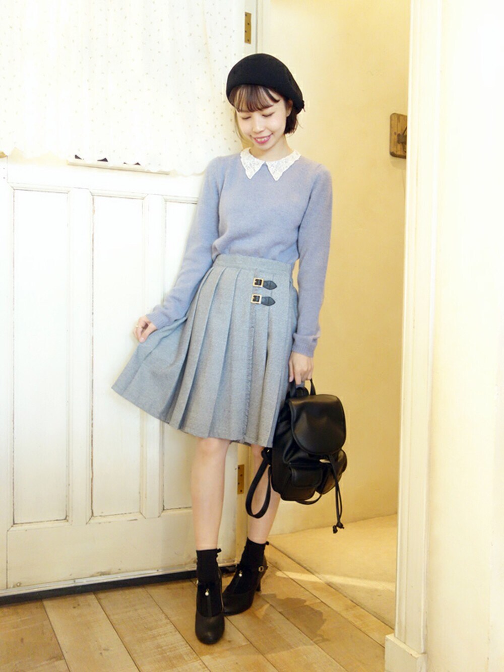 その他のニット/セーター、その他のスカート、その他のバックパック/リュックを着用したレディースの冬コーディネートの1枚目の写真