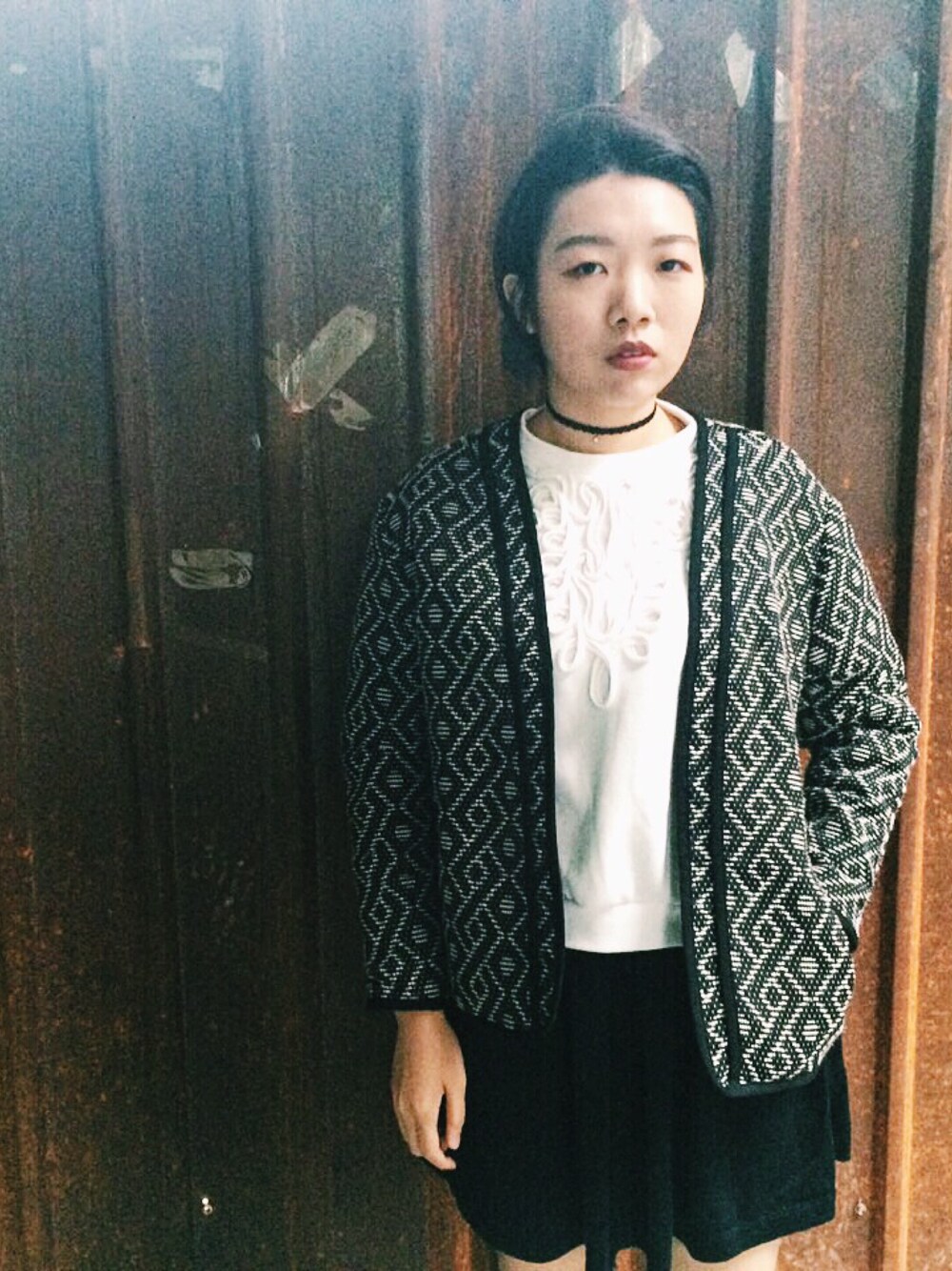 ブラック系のジャケット/アウターを着用したレディースの春コーディネートの1枚目の写真