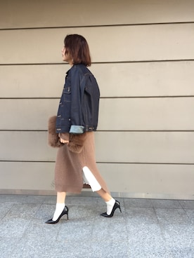 「アイテム（クラッチバッグ）」を使った、SAAYA KOUZAWAさん（レディース・165cm）の冬コーディネート