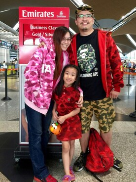Eric Liew is wearing A BATHING APE "1ST CAMO 6 POCKET SHORTS"