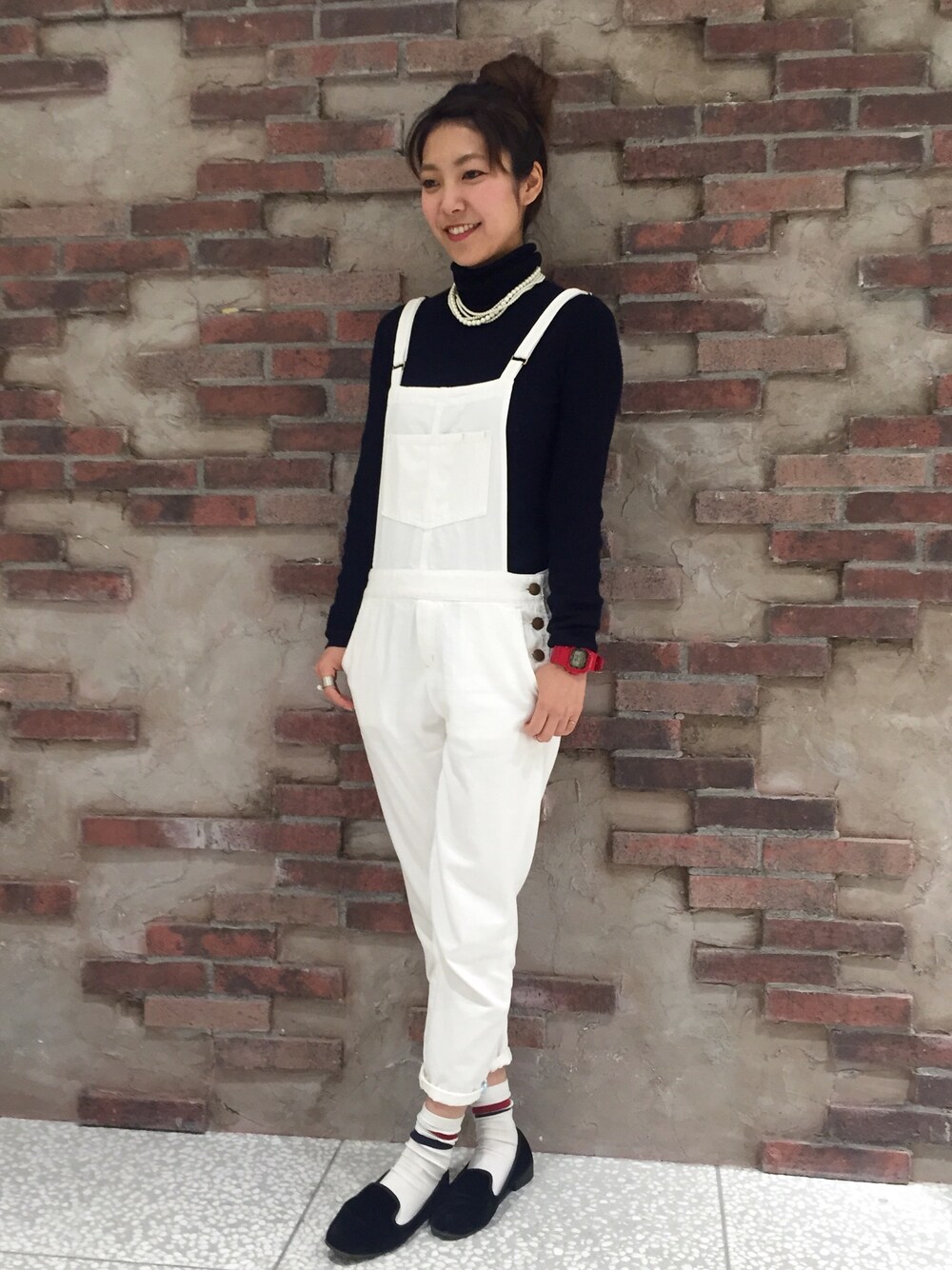 ブラック系のその他シューズを着用したレディースの冬コーディネートの1枚目の写真