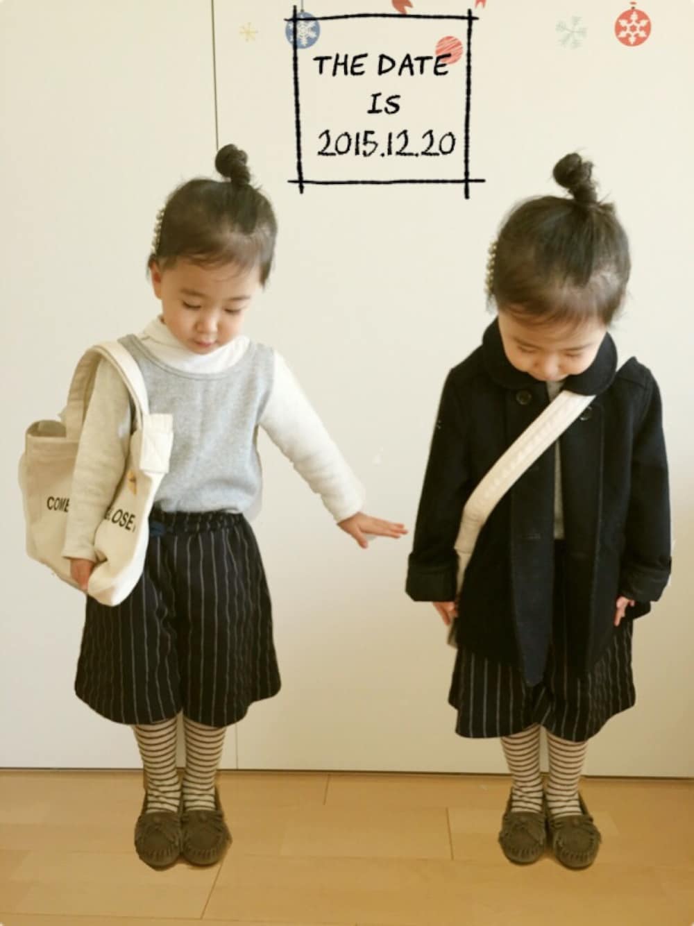 シルバー系のワンピース/ドレス、ブルー系のその他パンツ、ホワイト系のトートバッグを着用したキッズの冬コーディネートの1枚目の写真
