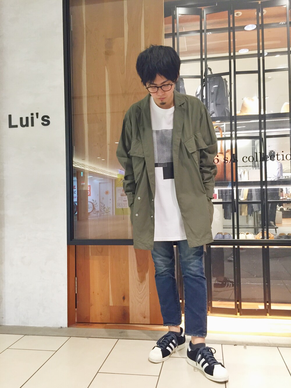 「春コーデ、休日スタイル、ストリート、ミリタリー、ミリタリージャケット、Tシャツ、スニーカー、デニム」｜「FACETASMのアイテム（ミリタリージャケット、グリーン系）」を使った、yokaさん（メンズ・168cm）の春コーディネートの1枚目の写真