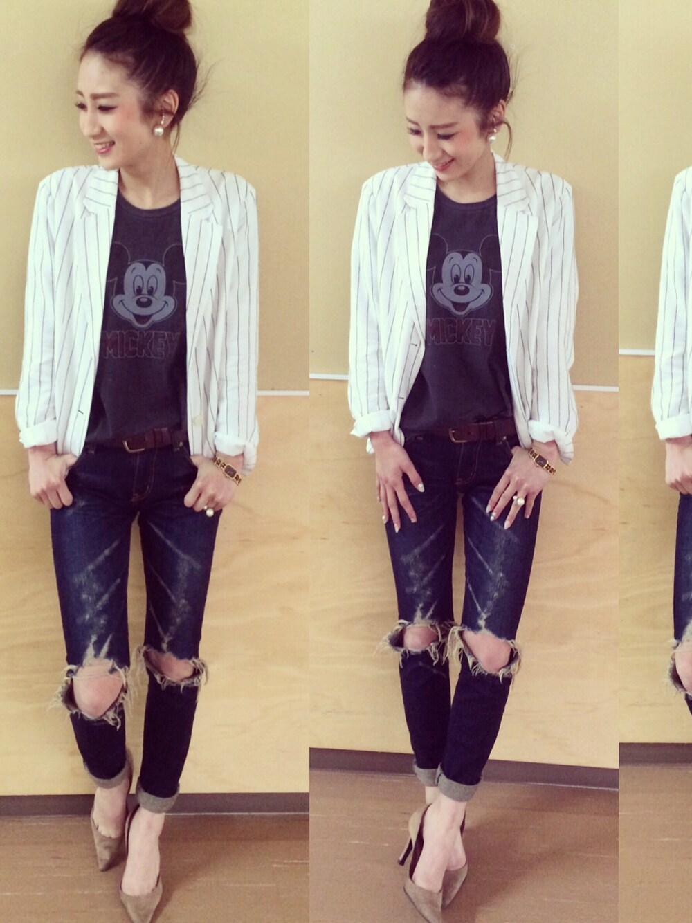 ブラック系のTシャツ/カットソー、ブルー系のデニムパンツを着用したレディースの冬コーディネートの1枚目の写真