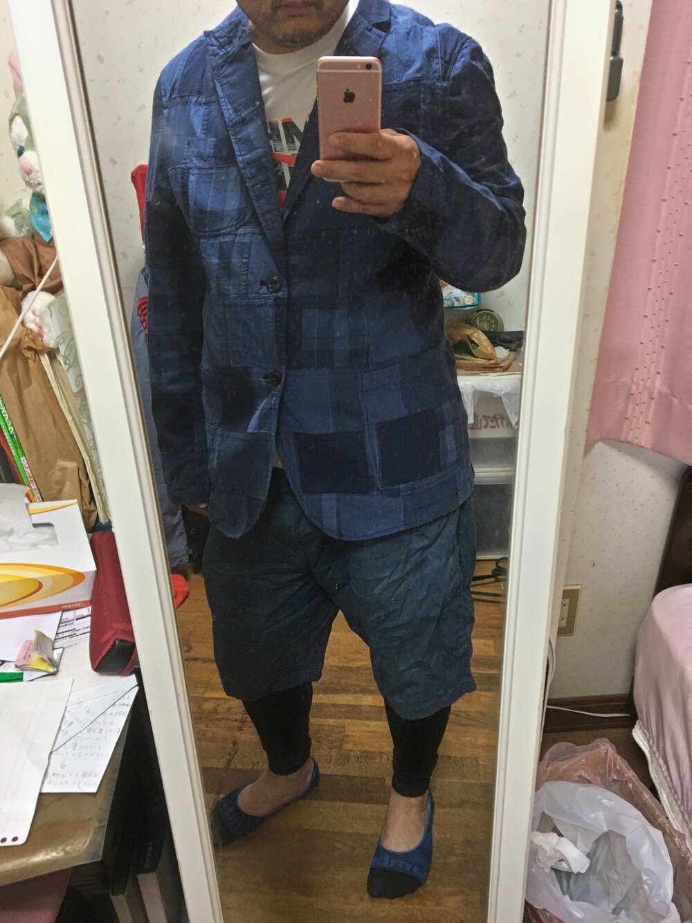 「TOMMY HILFIGERのアイテム（ジャケット/アウター、ブルー系）」を使った、Georges St-Pierreさん（メンズ・175cm）の夏コーディネートの1枚目の写真