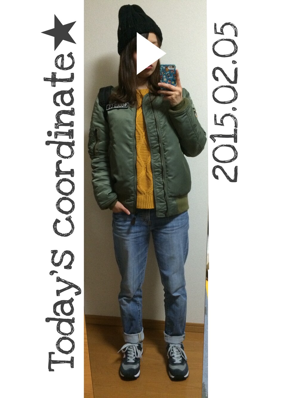 ブラック系のバックパック/リュック、グリーン系のミリタリージャケットを着用したレディースの冬コーディネートの1枚目の写真