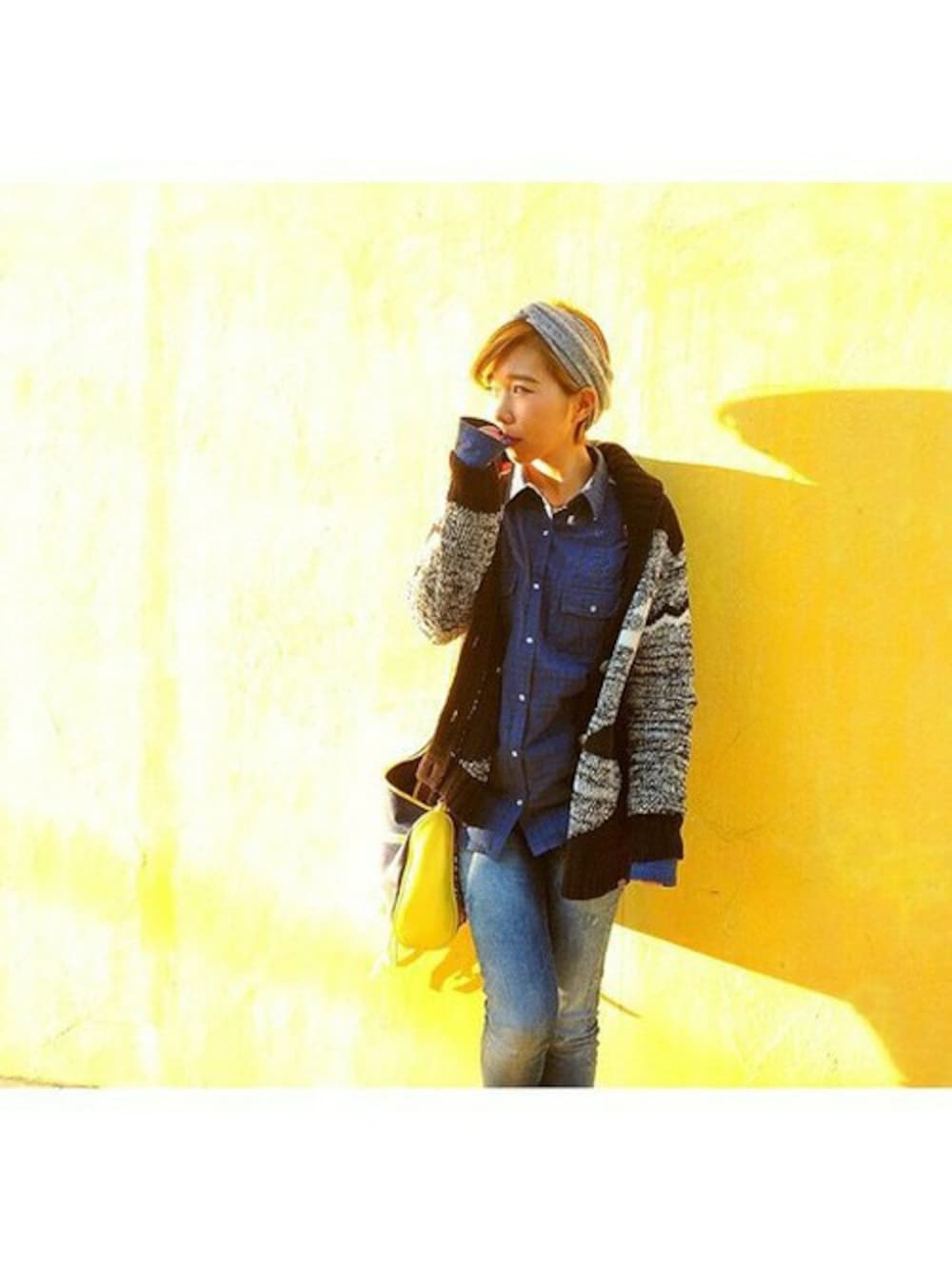 ブラック系のカーディガン/ボレロを着用したレディースの春コーディネートの1枚目の写真