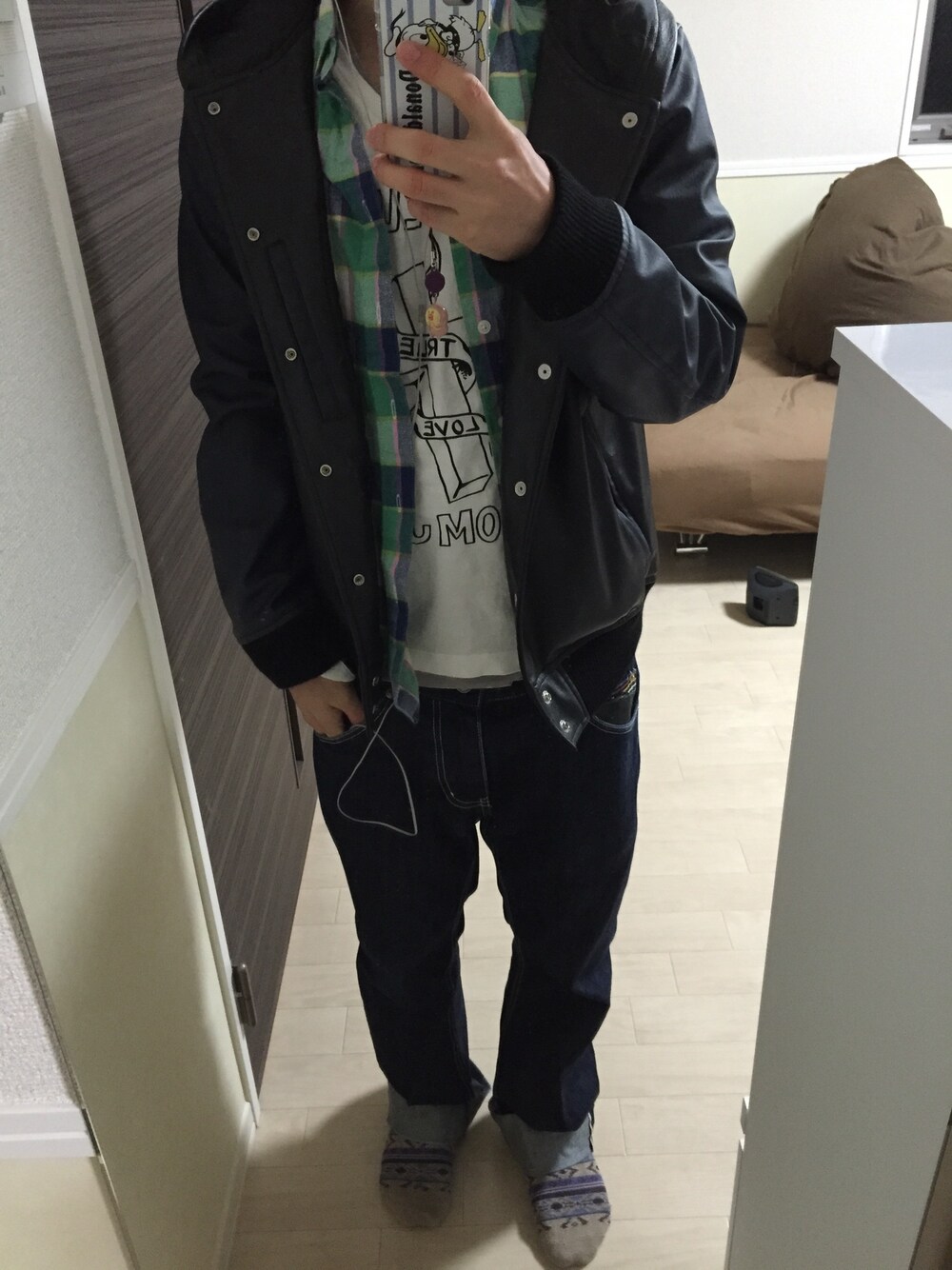 「TOMMYのアイテム（ライダースジャケット、その他）」を使った、ユウさん（メンズ・168cm）の冬コーディネートの1枚目の写真