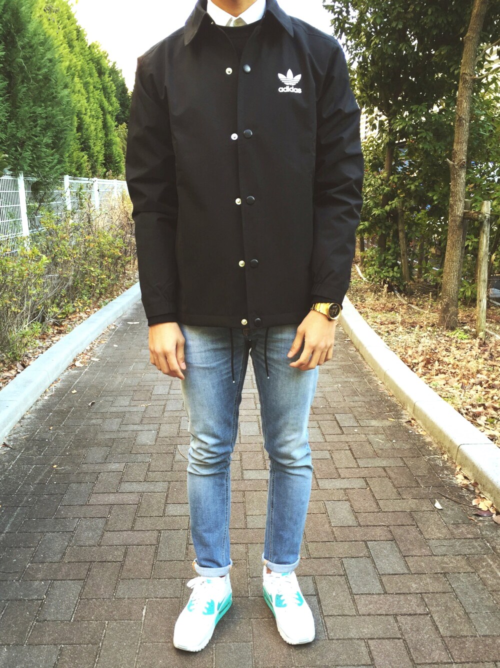 「street」｜「NIXONのアイテム（アナログ腕時計、ゴールド系）」を使った、faizminumkopiさん（メンズ・173cm）の冬コーディネートの1枚目の写真