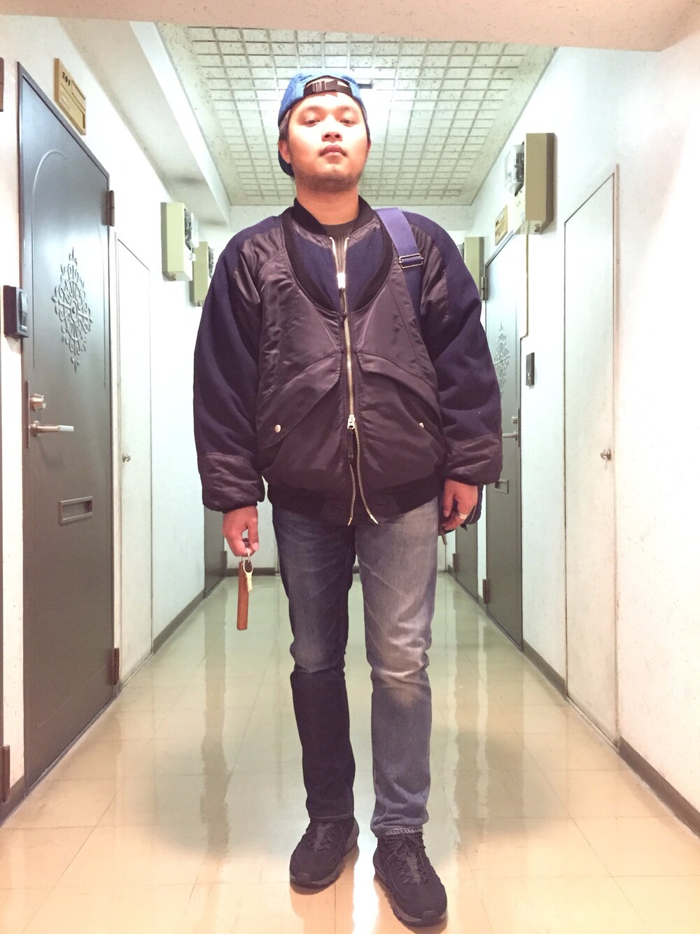 「MA-1」｜「TAKAHIROMIYASHITATheSoloIst.のアイテム（ミリタリージャケット、ブルー系）」を使った、Jero Tuさん（メンズ・168cm）の春コーディネートの1枚目の写真