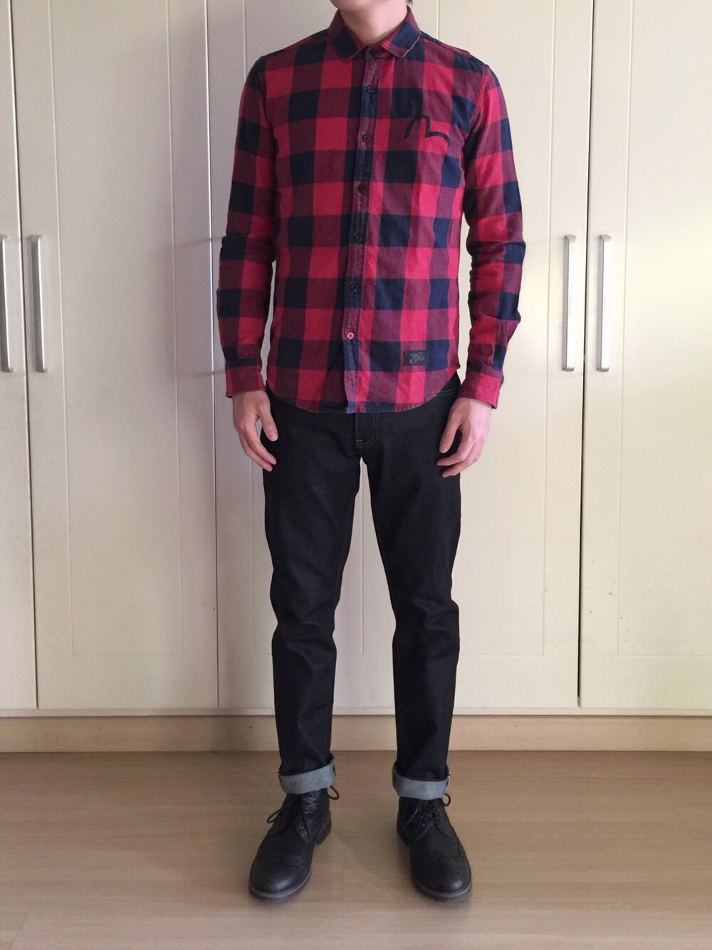 「Clarksのアイテム（ブーツ、ブラック系）」を使った、张先生さん（メンズ・179cm）の冬コーディネートの1枚目の写真