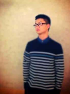 「UNICOM（ユニコン）のアイテム」を使った、李海波さん（メンズ・178cm）の秋コーディネート