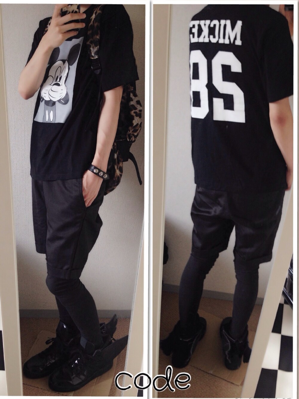 ブラック系のTシャツ/カットソー、ブラック系のチノパンツ、ブラック系のスニーカーを着用したメンズの夏コーディネートの1枚目の写真