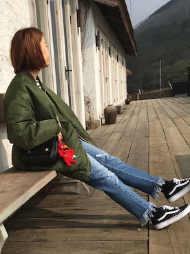 「VANS（バンズ）のアイテム（スニーカー、ブラック系）」を使った、小麦色kikiさん（レディース）の冬コーディネート